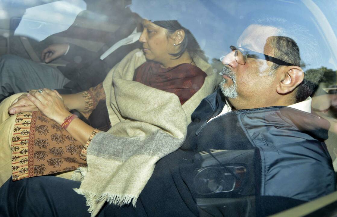 Rajeshas Talwaras su žmona Nupur 