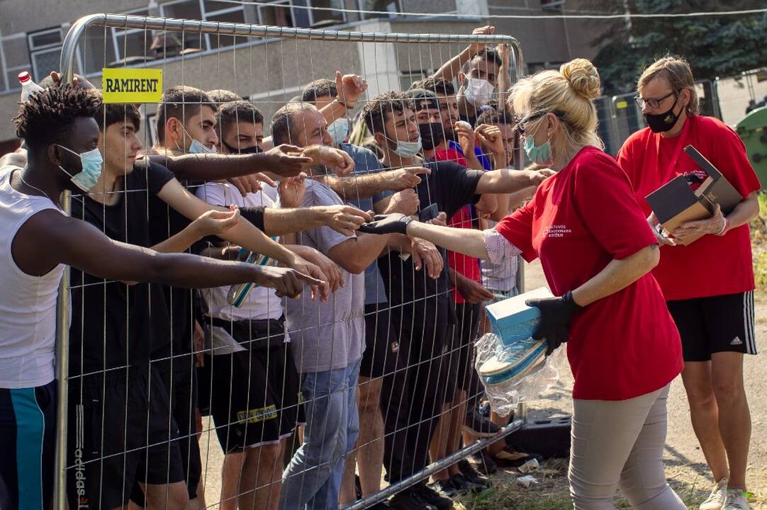 EK pripažino migrantų krizę pasienyje su Baltarusija hibridine ataka
