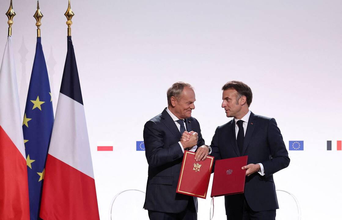  Donaldas Tuskas ir Emmanuelis Macronas