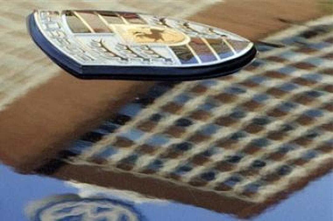 VW įsigis daugiau “Porsche” akcijų