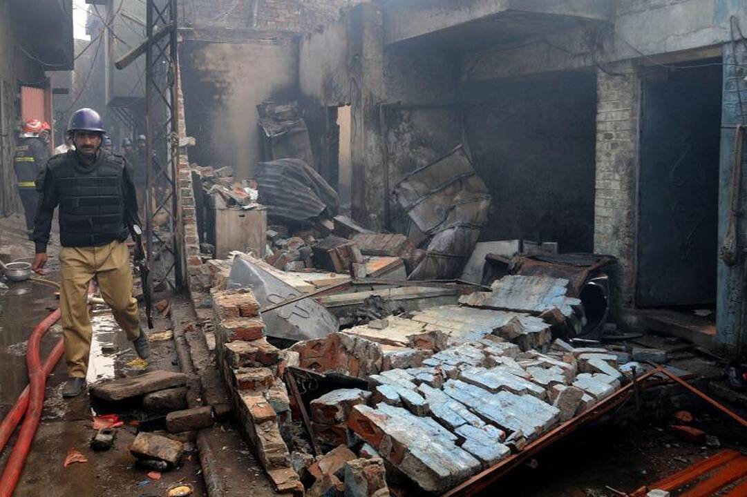 Pakistane įpykę musulmonai sudegino per 100 krikščioniškų namų