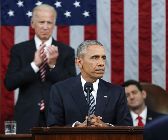 Barackas Obama ir Joe Bidenas (kairėje)