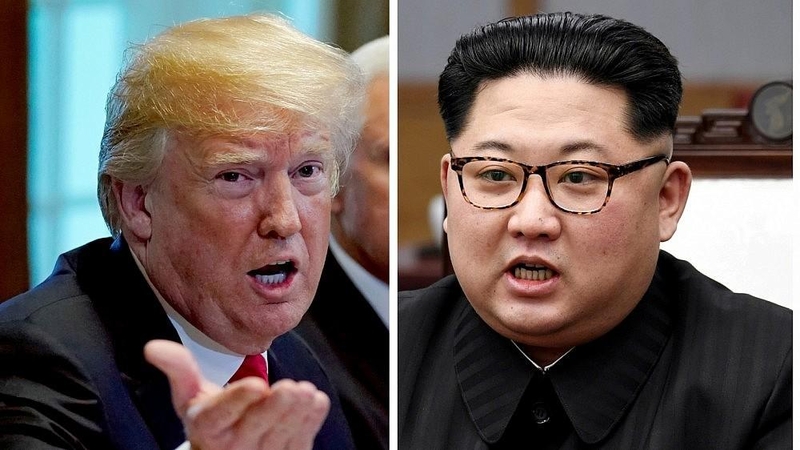 Donaldas Trumpas (kairėje) ir Kim Jong Unas