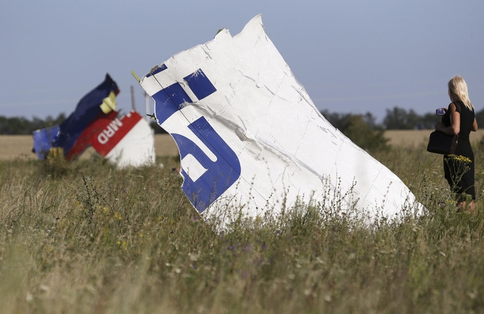 Identifikuota pirma Malaizijos lėktuvo katastrofos Ukrainoje auka