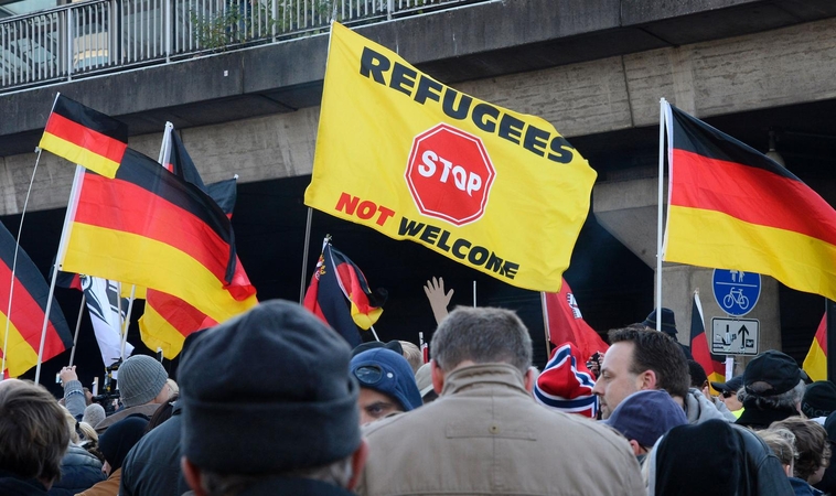 Vokietijos dešinieji reikalauja A. Merkel atsistatydinimo