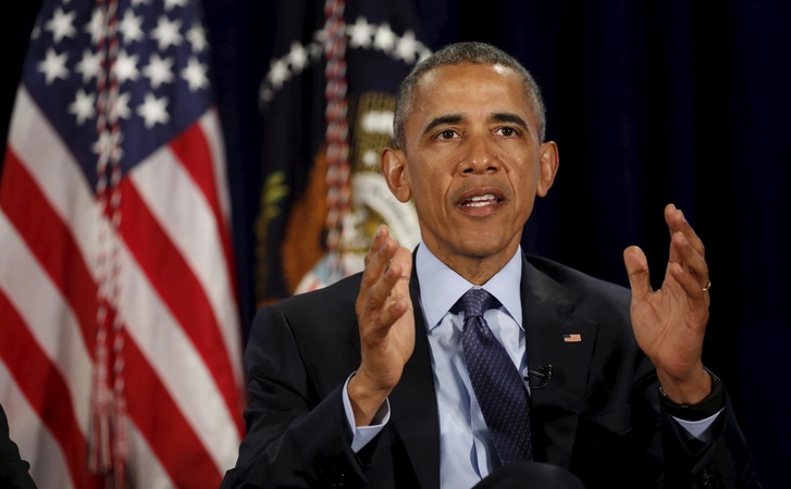 B. Obama džiugiai sutiko žinią apie naujojo Mianmaro prezidento priesaiką