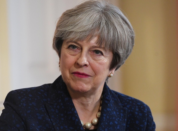 T. May: Didžioji Britanija iš ES pasitrauks sklandžiai ir tvarkingai